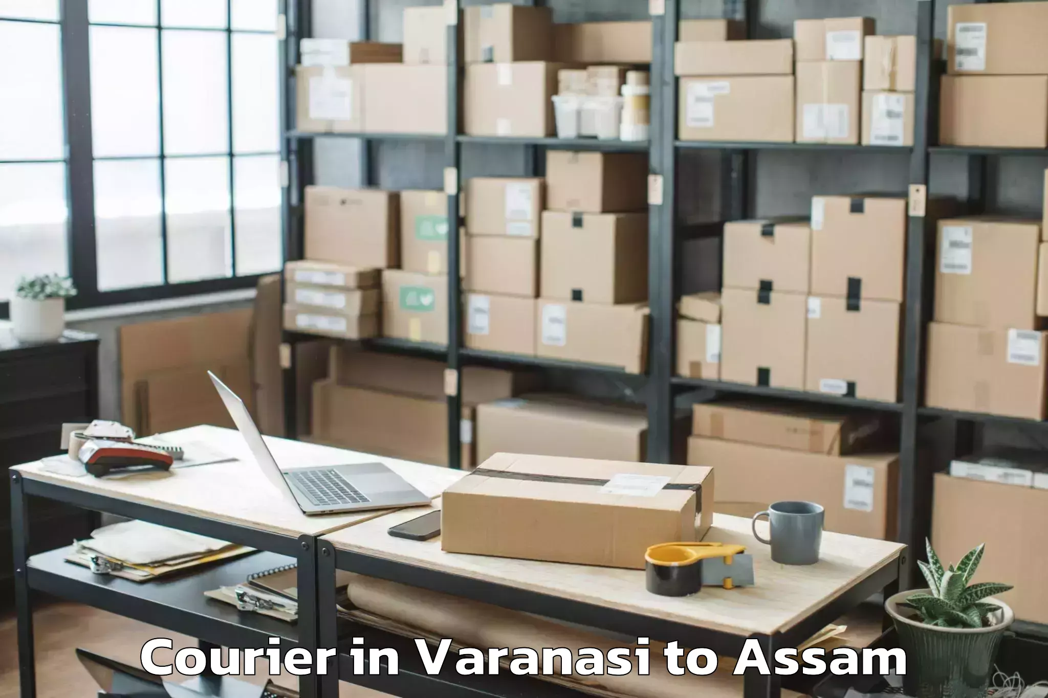 Varanasi to Sipajhar Courier Booking